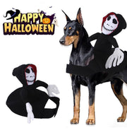 Pet Teddy Cape Halloween Costume featuring a spooky skeleton rider on a Doberman. Fun, adjustable outfit for dogs and cats, ideal for Halloween parties.